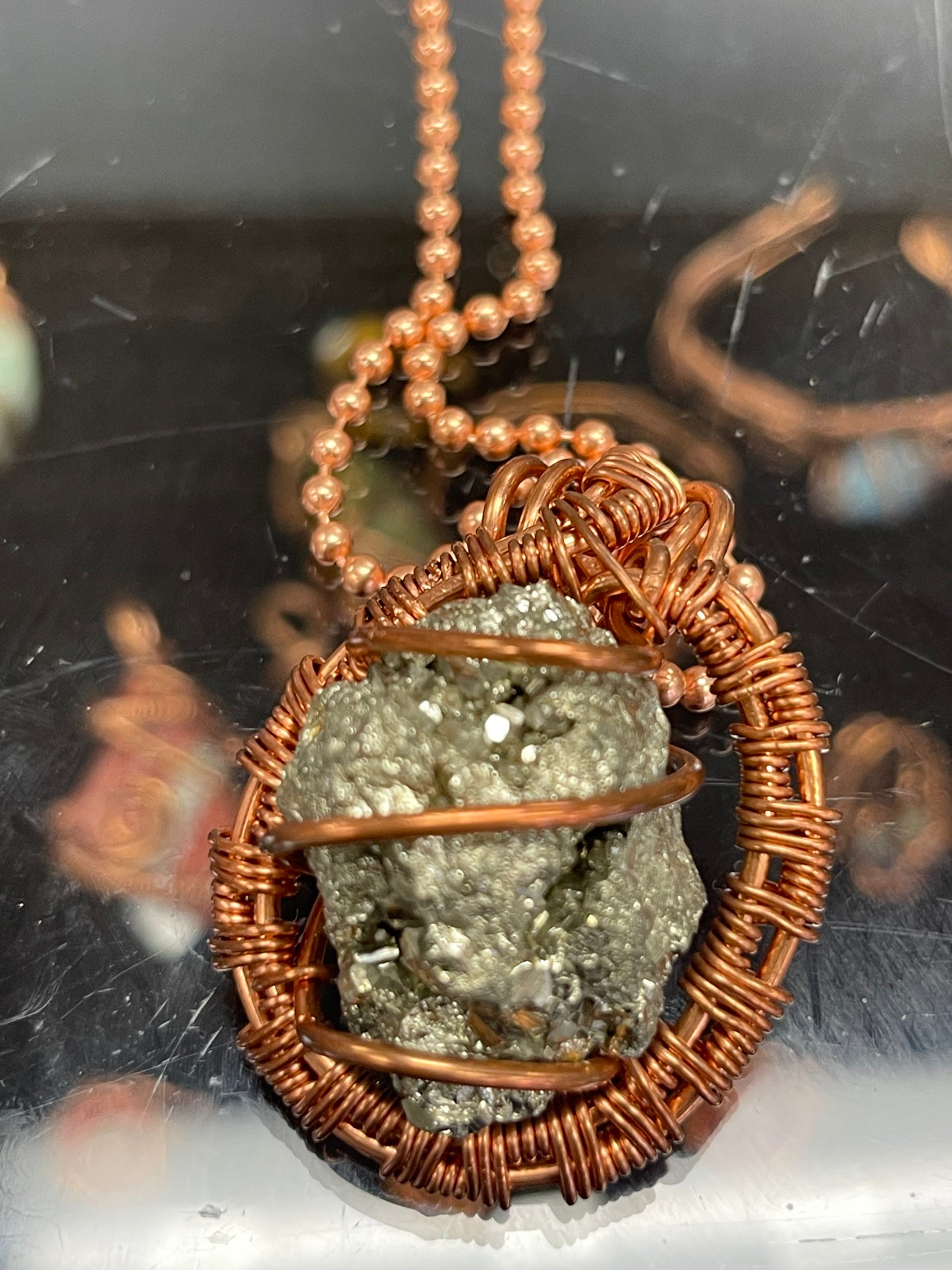 Pyrite Crystal wrapper in copper